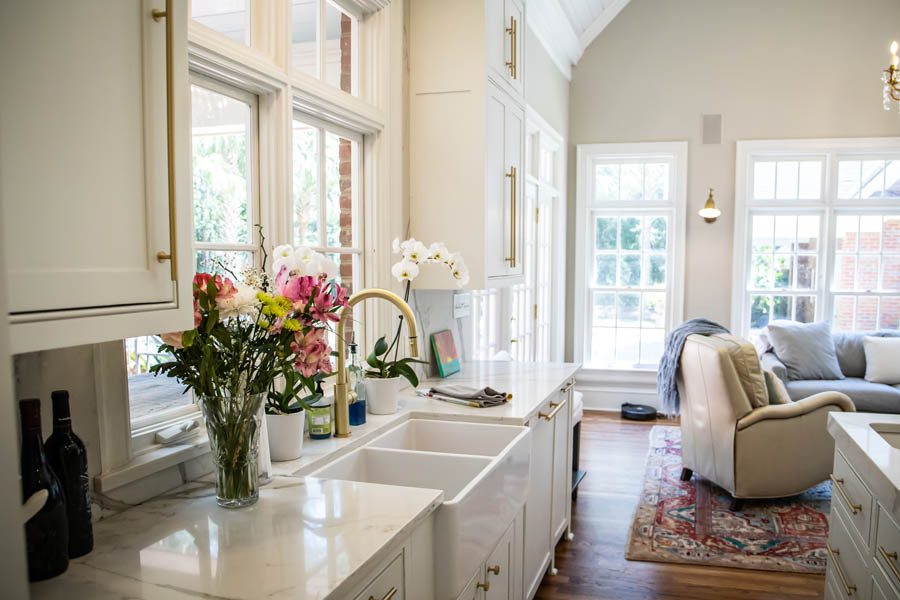 Personal Insurance - Modern Farmhouse Kitchen with a Gold Faucet and Flowers by the Farmhouse Sink